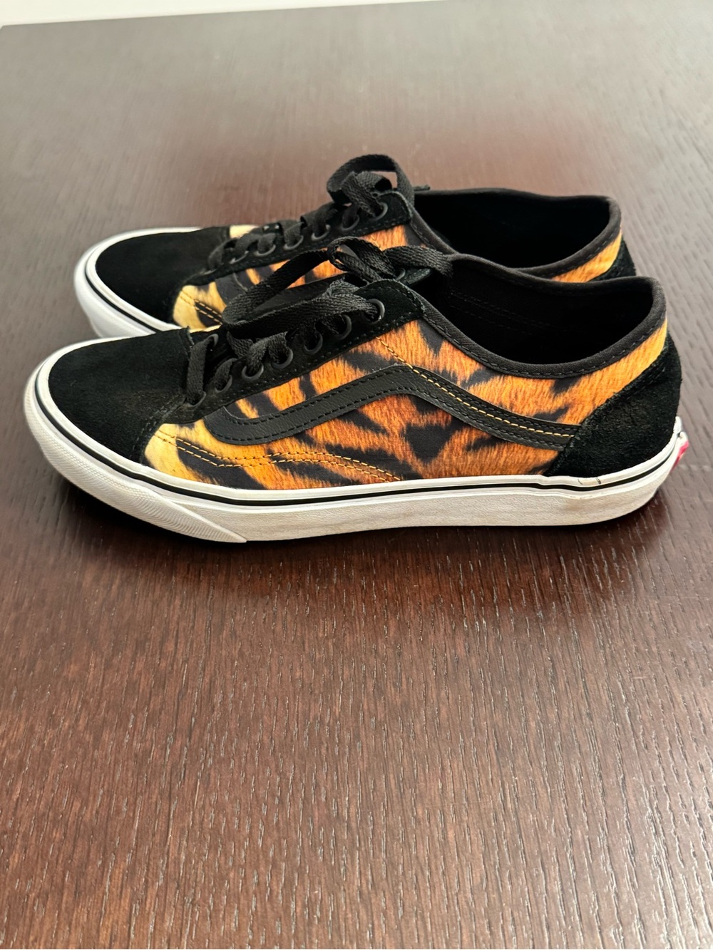 Vans Tiger-Print Low Top Sneakers in Black and Orange